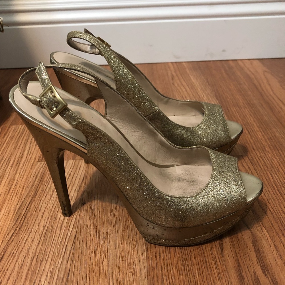 Pelle Moda gold high heel size 7